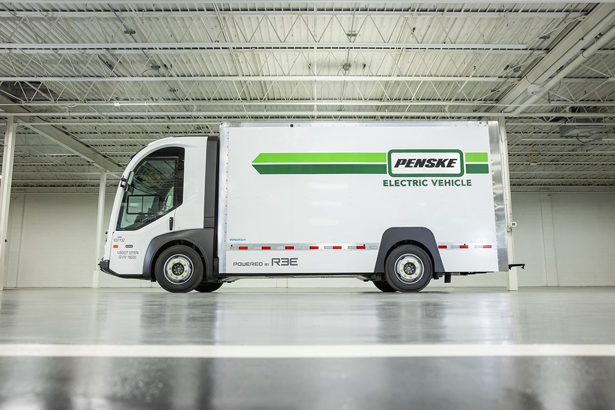 Still image of a REE Automotive, P7-C electric truck with the Penske logo.