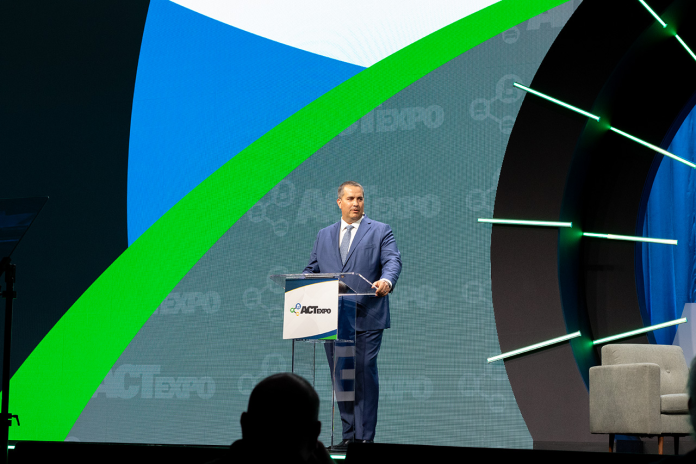 Erik Neandross, president of GNA, a TRC Company, addresses the audience during the opening of the 2024 ACT EXPO in Las Vegas, Nevada, on May 20.